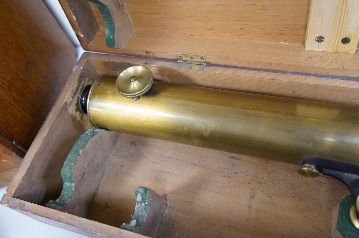 A 19th century brass telescope by Yeates & Son, Dublin, with integral brass and cast iron stand, in a pine case with labels to the inside of the lid, case 102cm long, 23cm deep, 13.5cm high. Condition - fair, splits to t